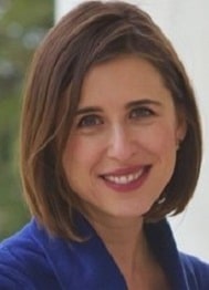 Allison Murphy, a dark haired woman wearing a blue shirt.