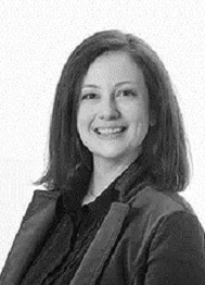 Delisa Ragsdale, a dark haired woman wearing a dark shirt.